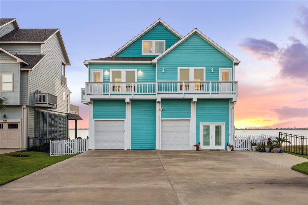 street side with oversized driveway