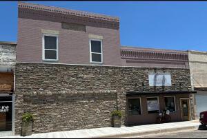 a view of a building with a street