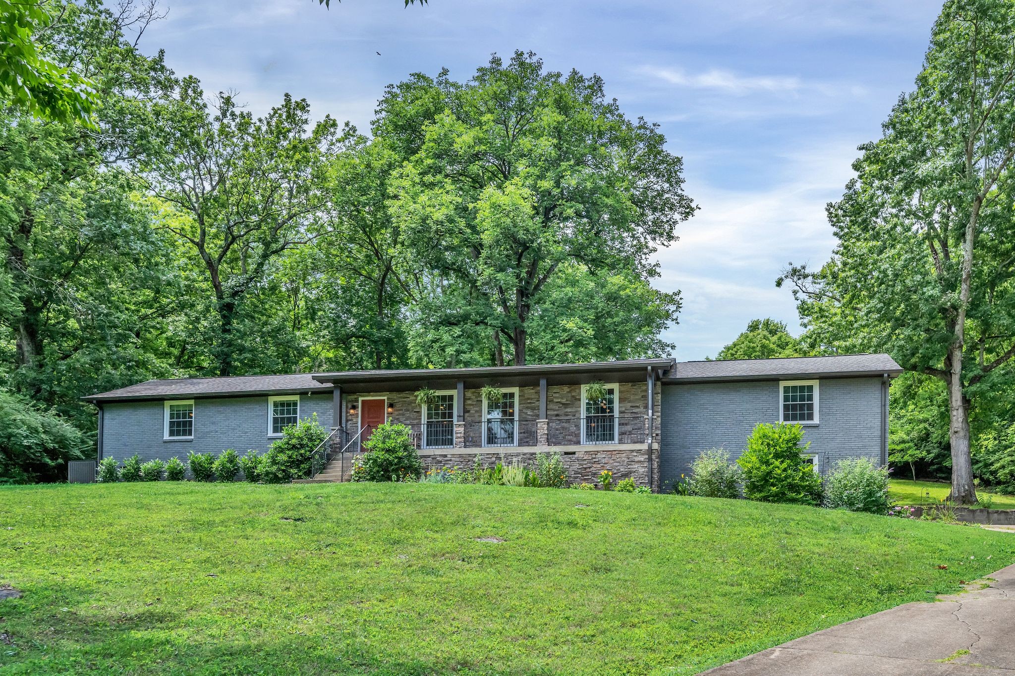 front view of a house and a yard