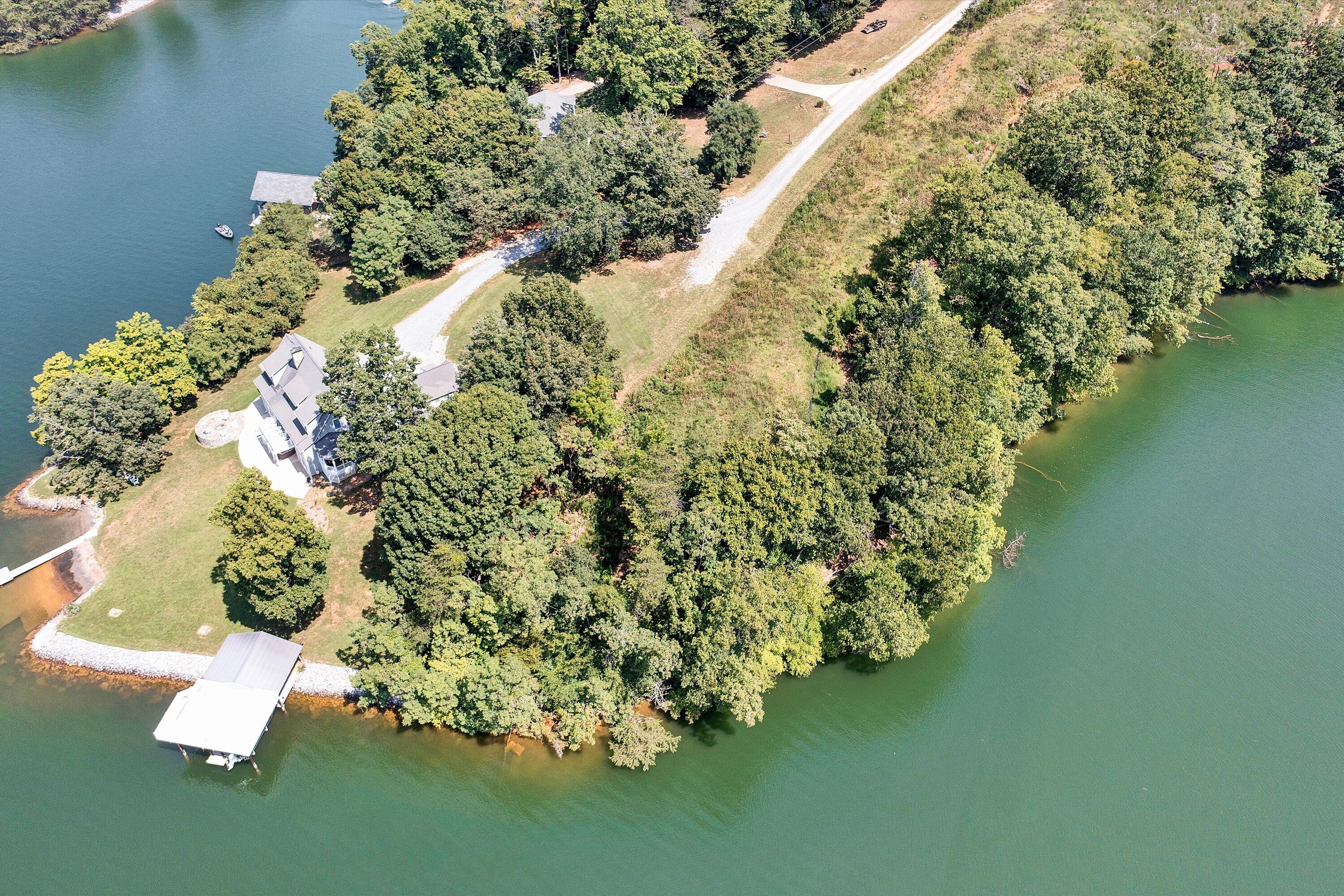 a view of a lake with a house