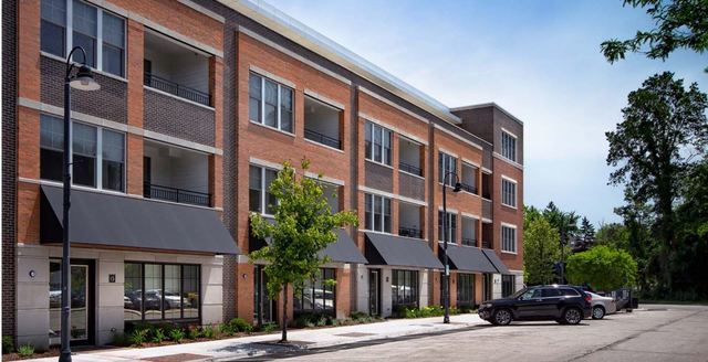 a front view of a building with street view