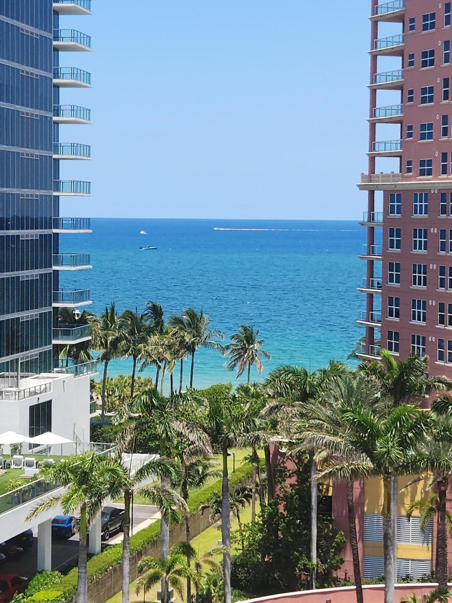 a view of a city with tall buildings