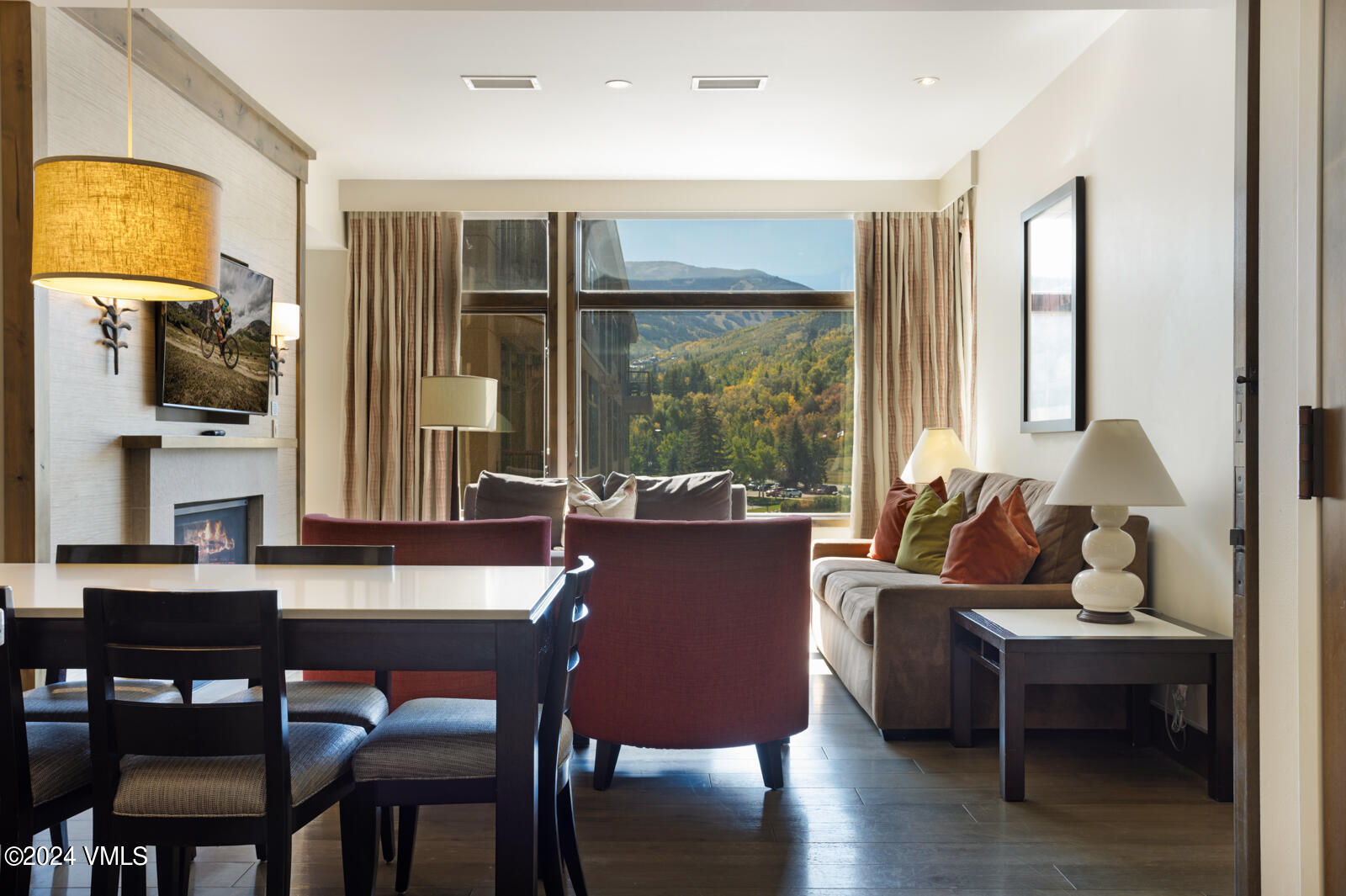 a view of a dining room with furniture window and outside view