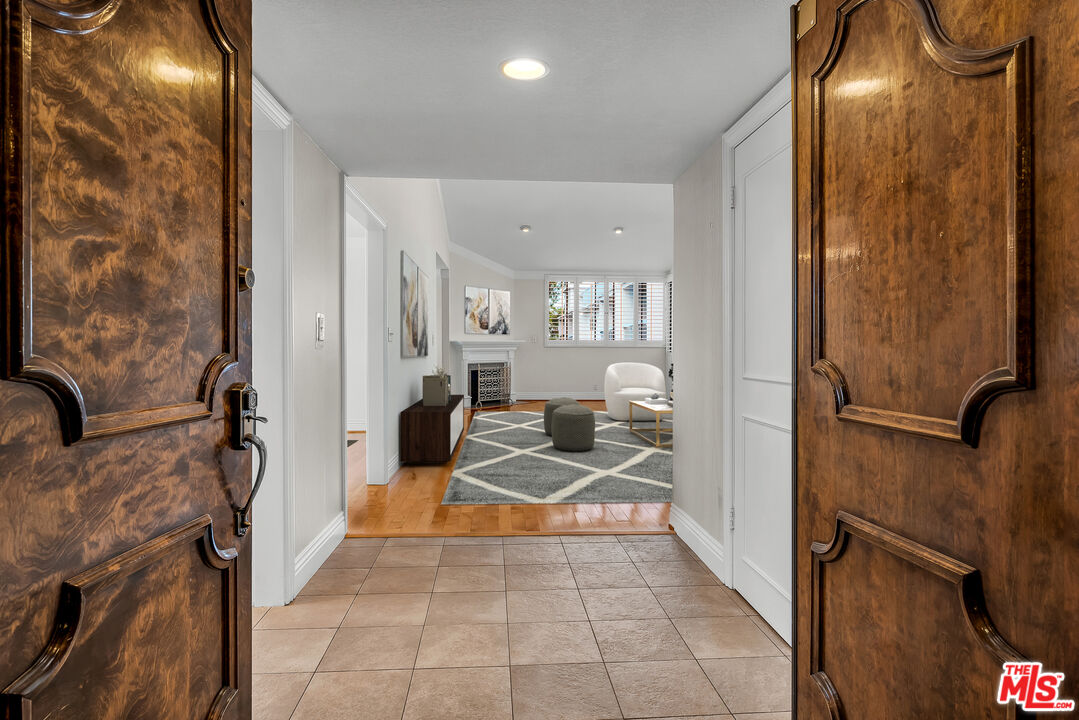 a view of a kitchen from the hallway