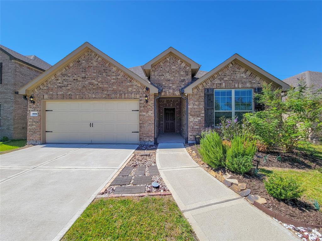 Discover elegance in this Pulte Home featuring the sought-after McKinney floor plan, showcasing timeless brick architecture and a welcoming entrance.