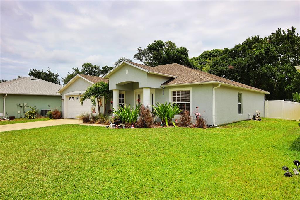 a view of a house with a big yard