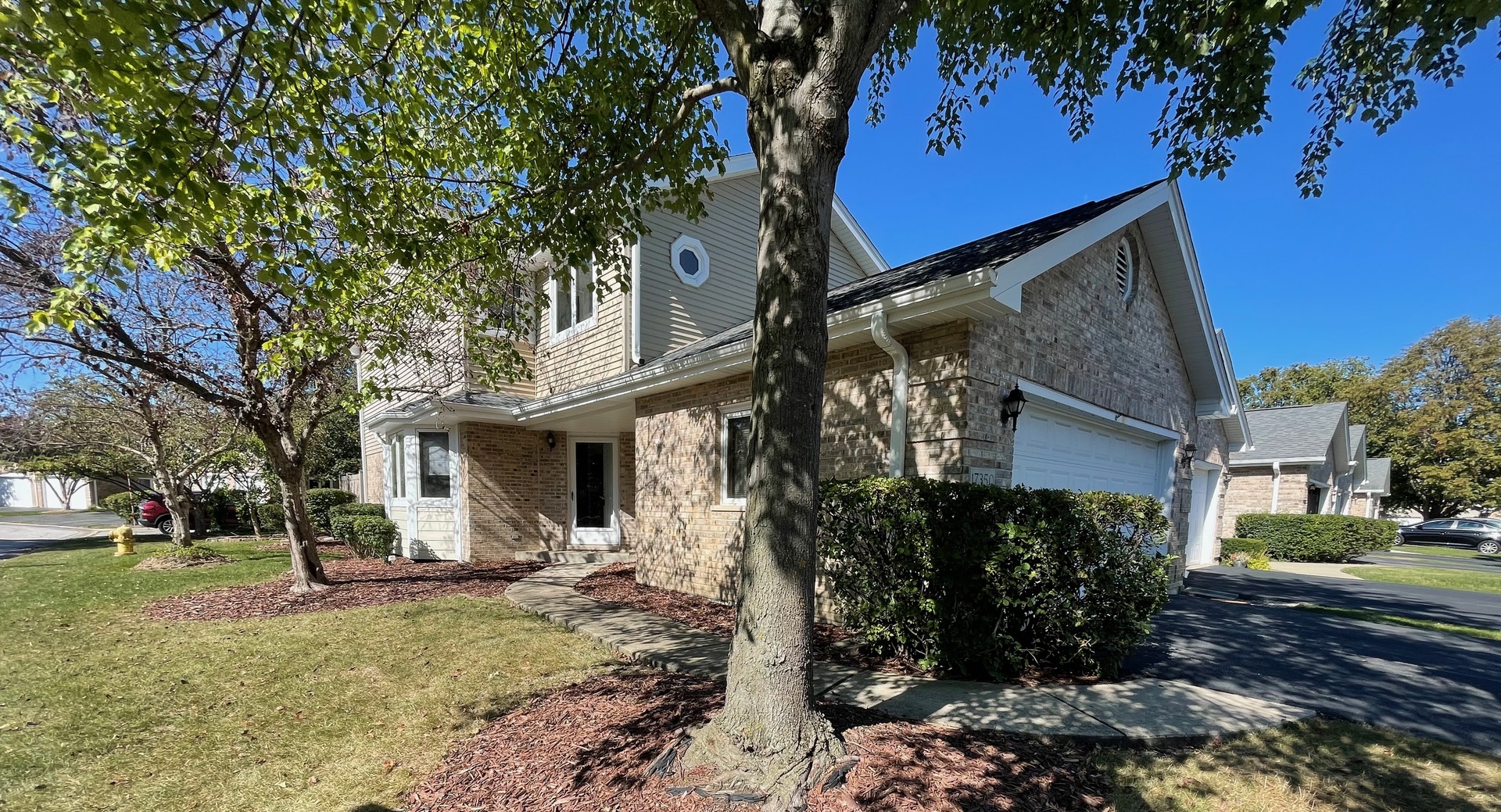 a view of a house with a yard