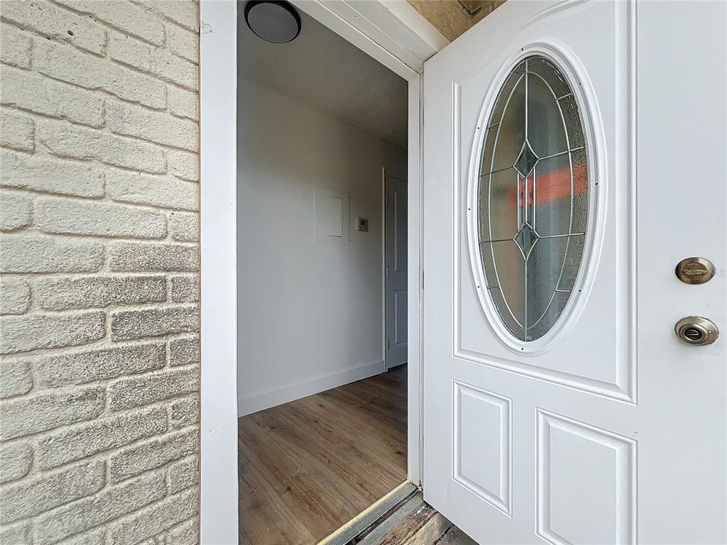 a view of a door with washer and dryer