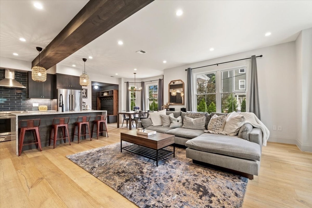 a living room with furniture and a table