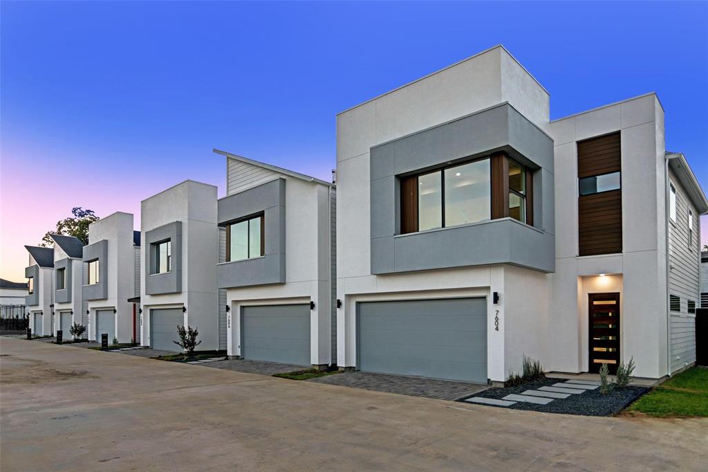 a front view of a house with a garage