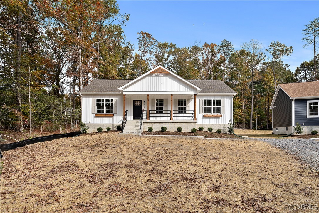 View of front of property with covered porch