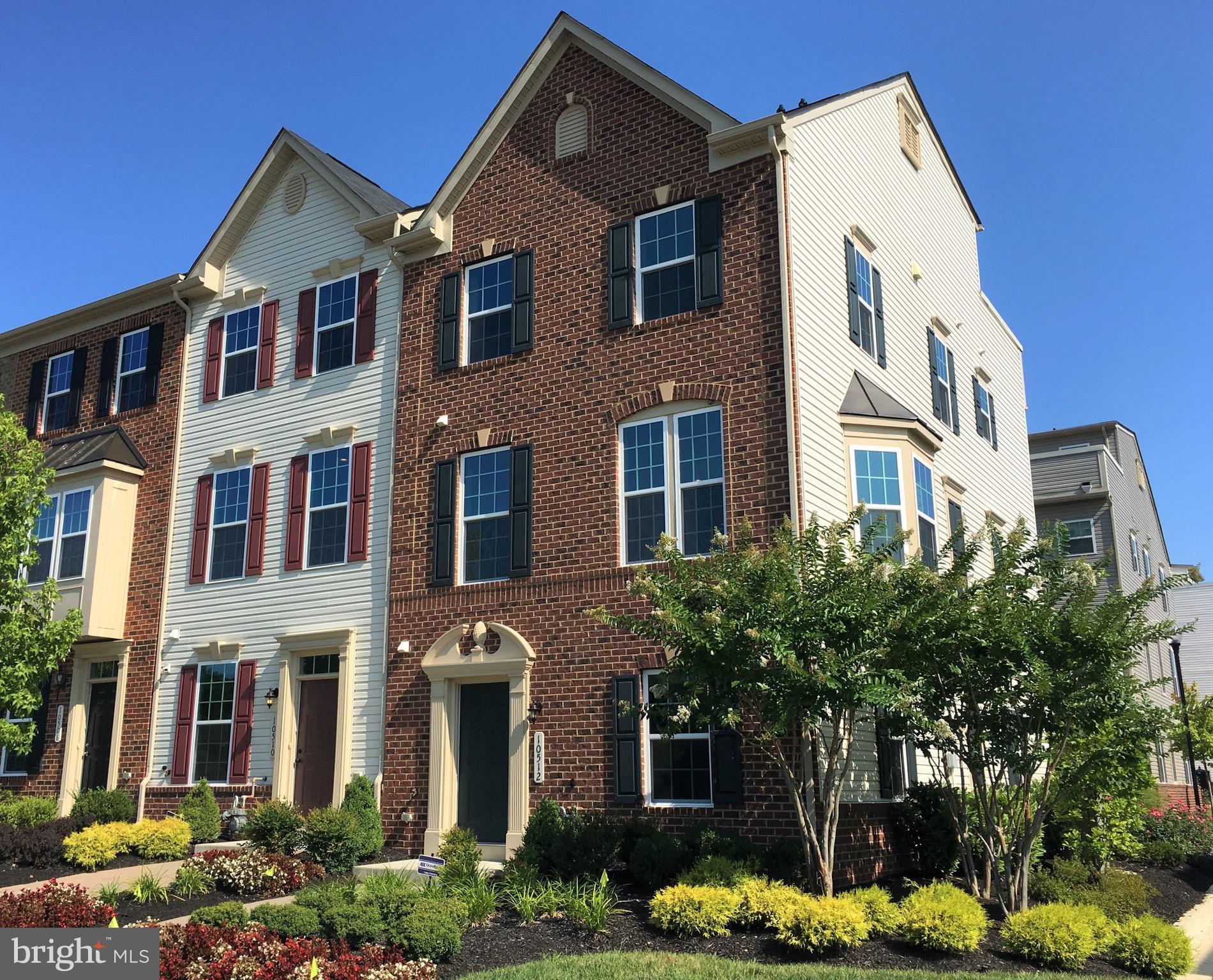 a front view of a multi story residential apartment building