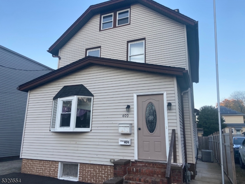 a front view of a house with entryway