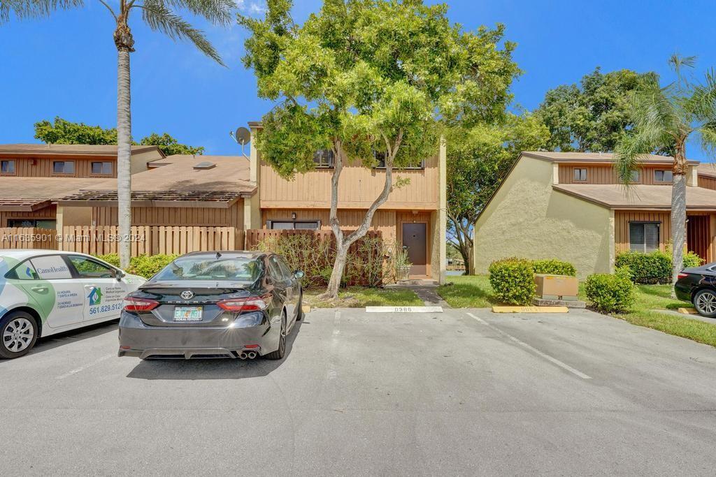 a car parked in front of a house