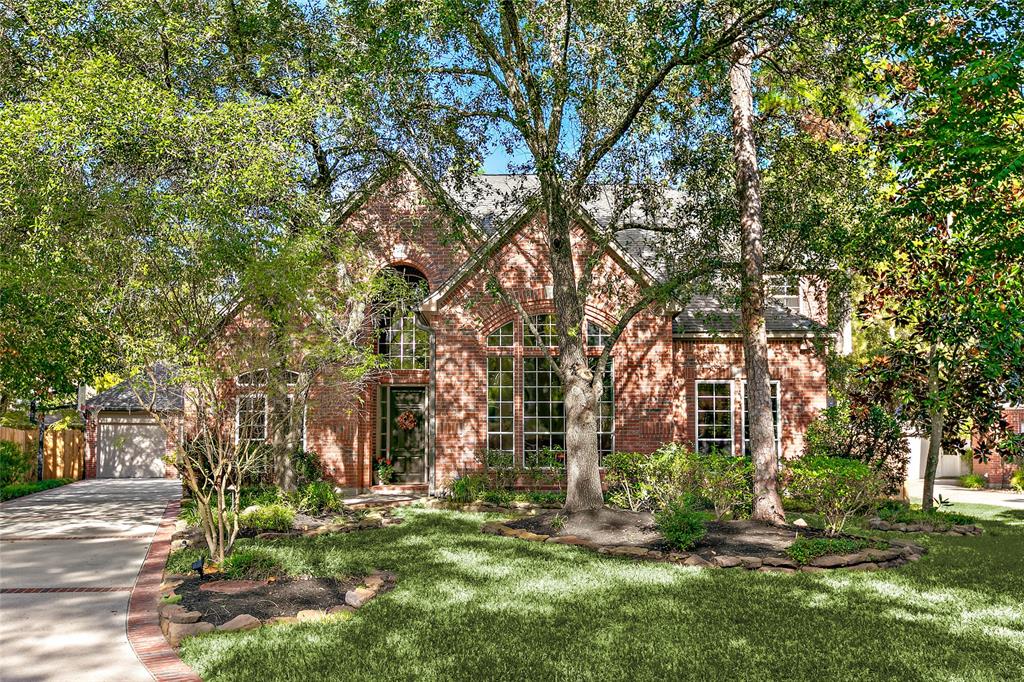 Welcome home to 106 E Morning Cloud, in the highly sought after Village of Cochran's Crossing, in the heart of The Woodlands!