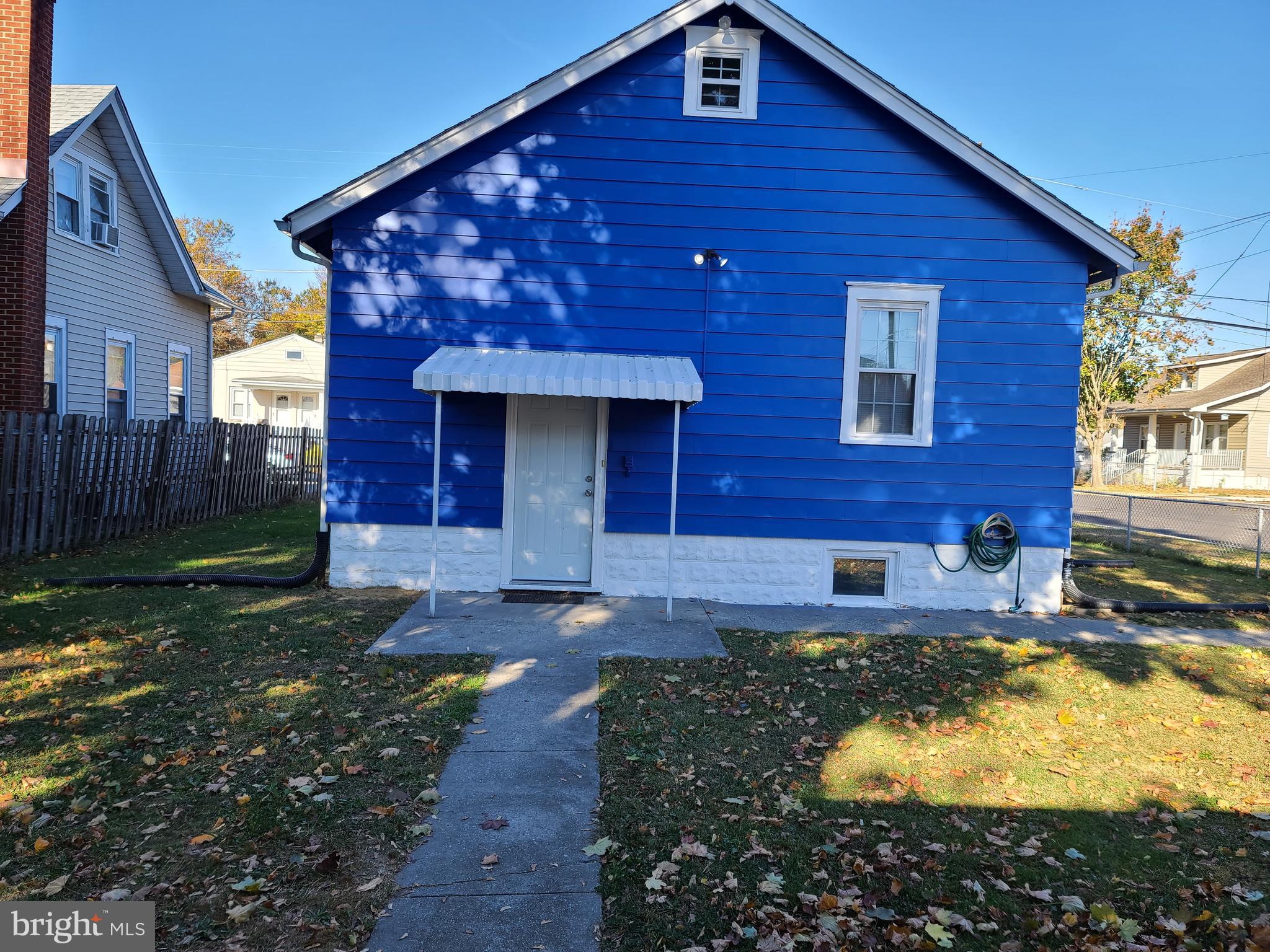 a front view of a house with yard