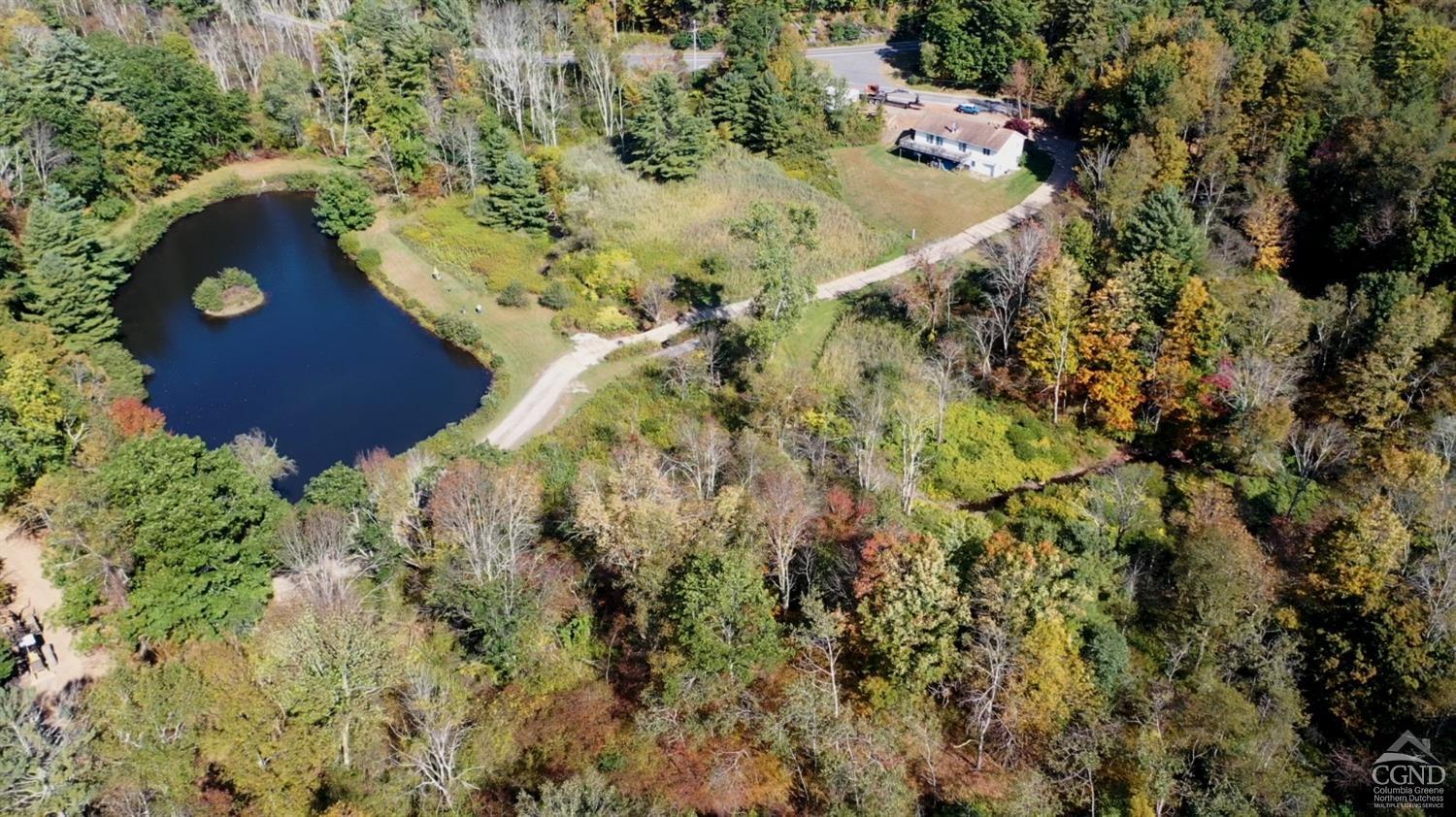 an aerial view of residential house with outdoor space