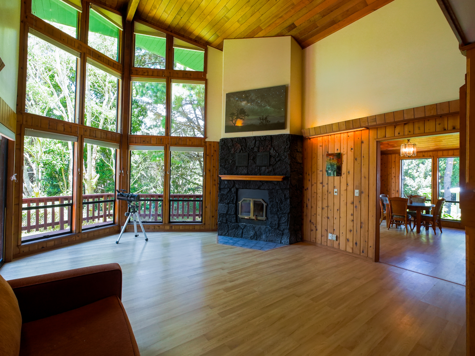 Windows...windows and more majestic windows to enjoy your view and an incredible lava rock fireplace (on those nights, a little ambience or warmth will fill the need......at 99-2034 Popohau Pl