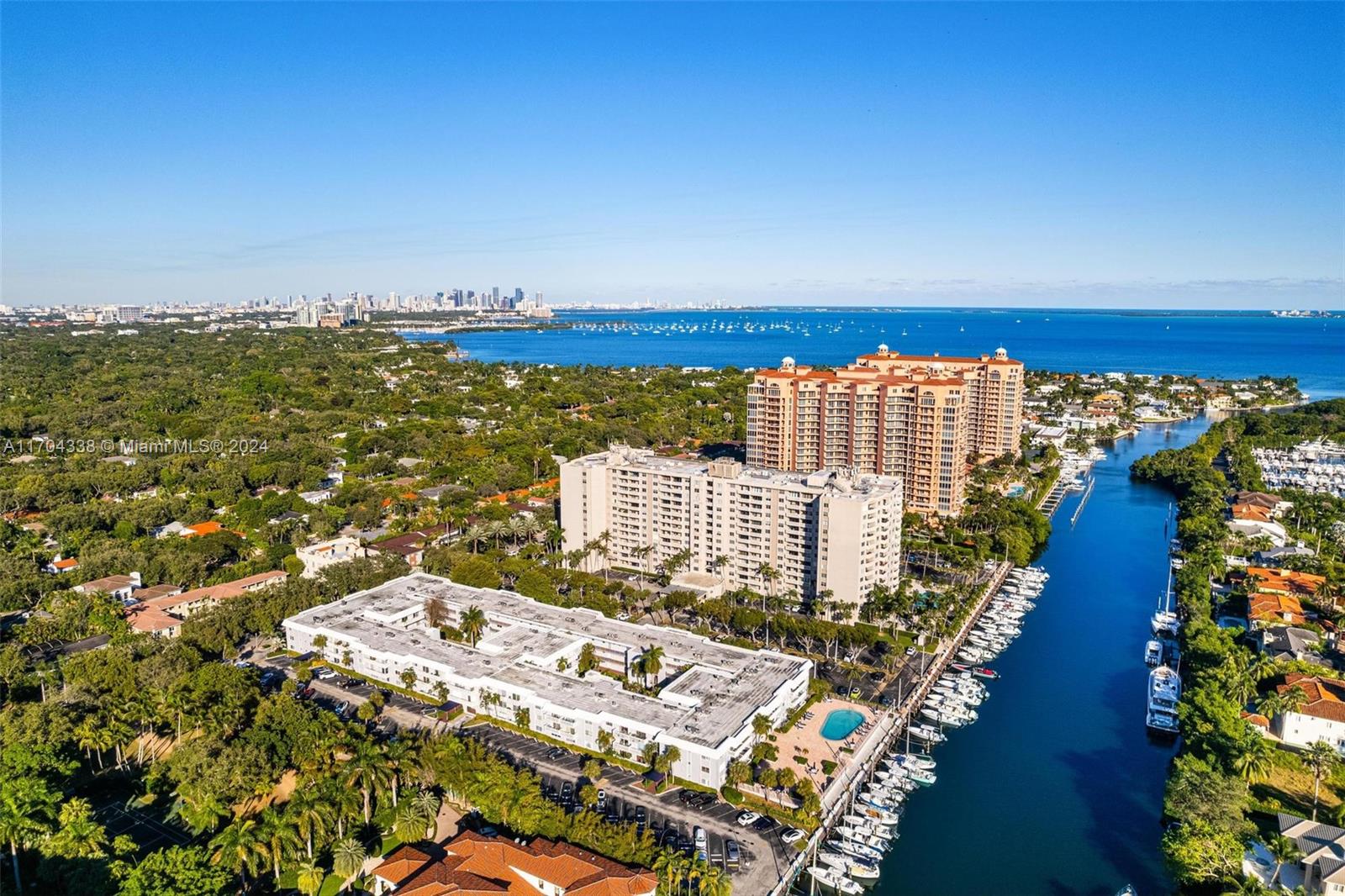 a view of a city with tall buildings in ocean