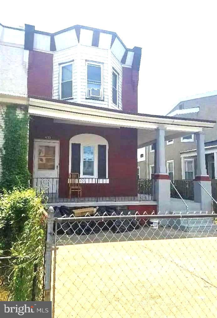 a front view of a house with yard