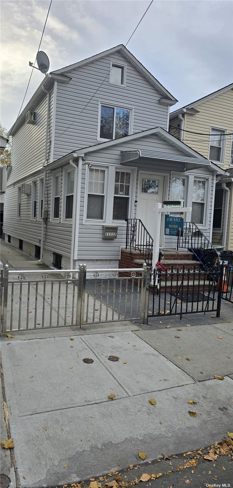 a front view of a house with balcony