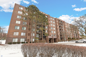 a view of a building with a yard