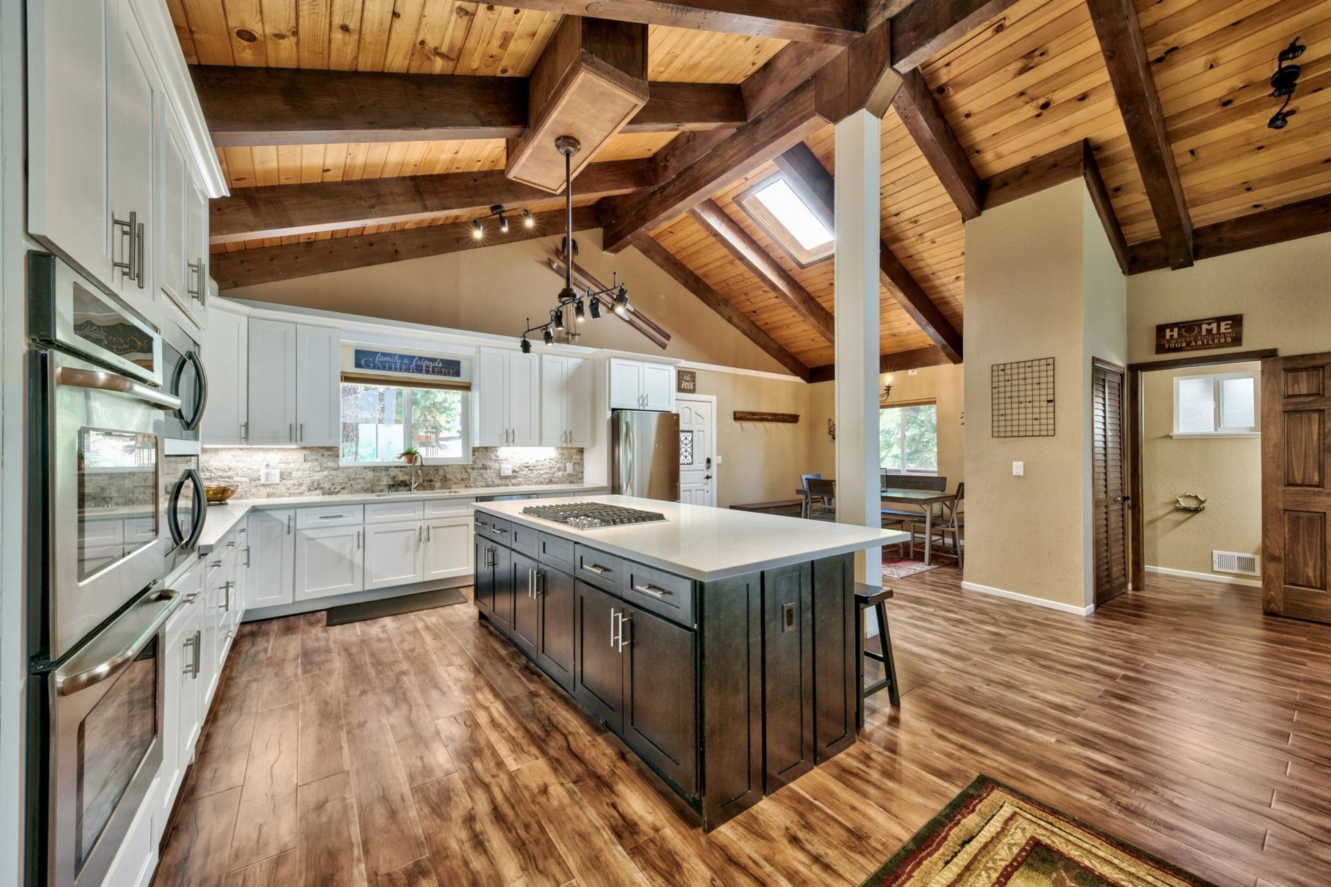 a kitchen with a stove and a sink