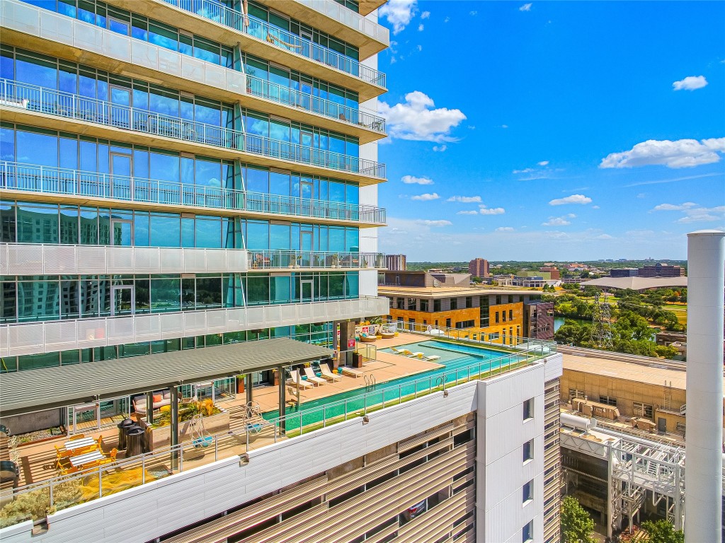 a view of a balcony with city view