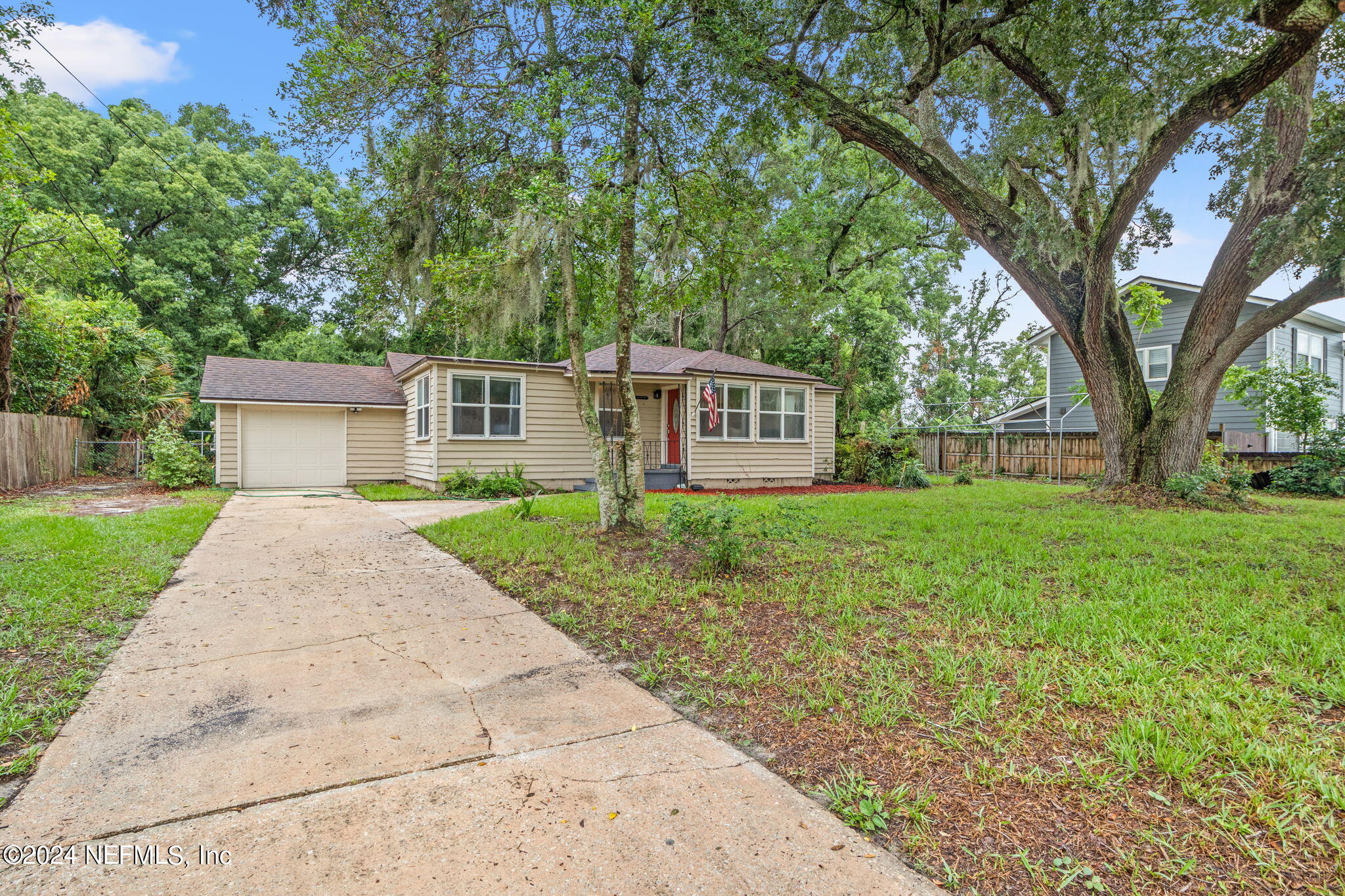 front view of a house with a yard