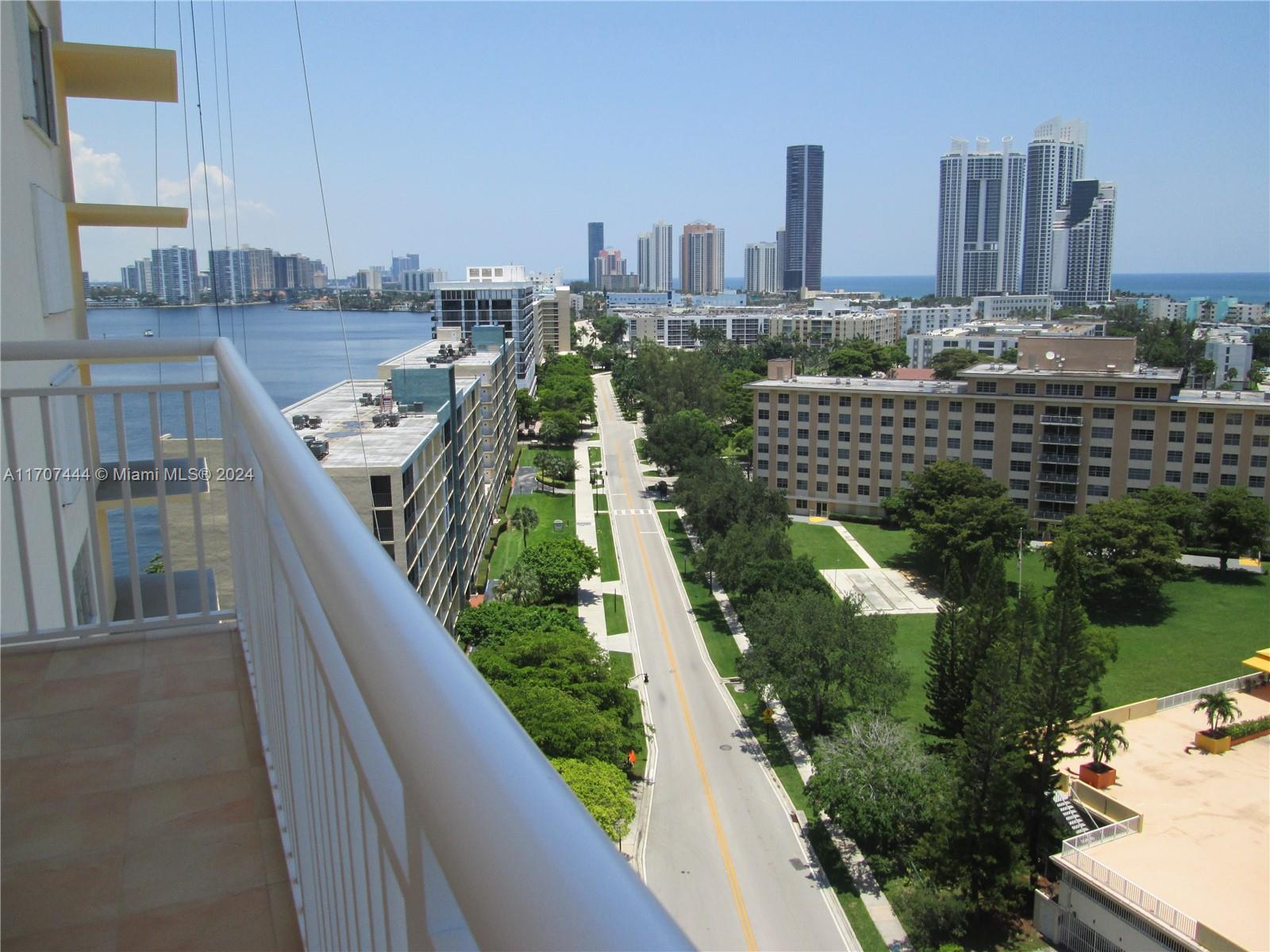 a view of a city with tall buildings