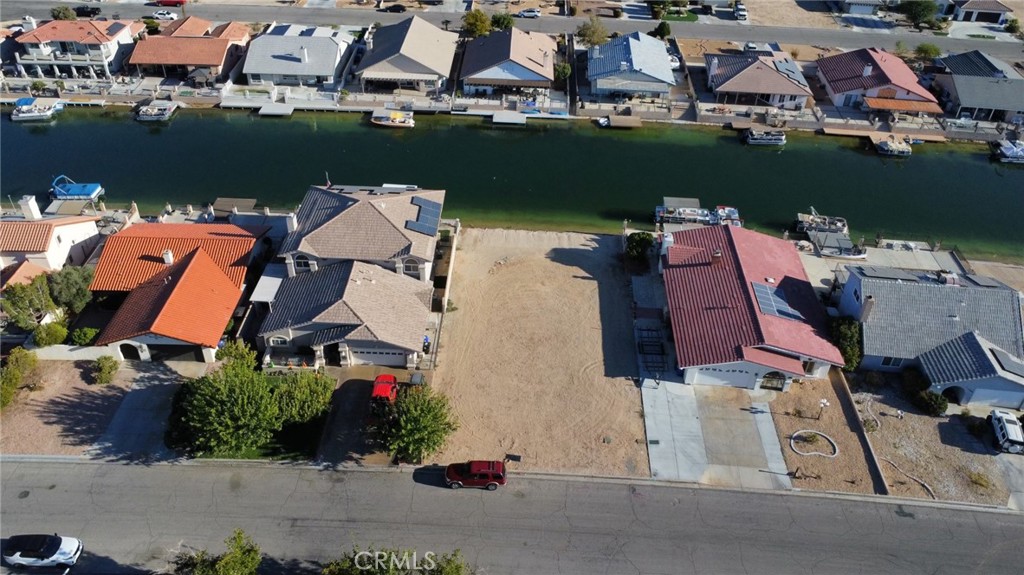 an aerial view of a house with a ocean view