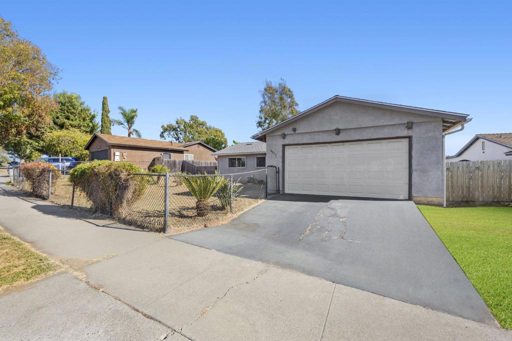 a view of a garage with a patio