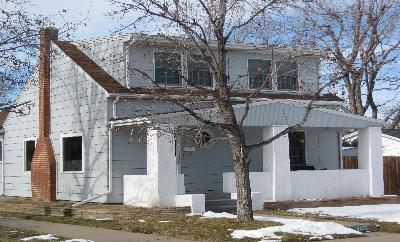 a front view of a house with street