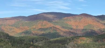 a view of mountains and valleys