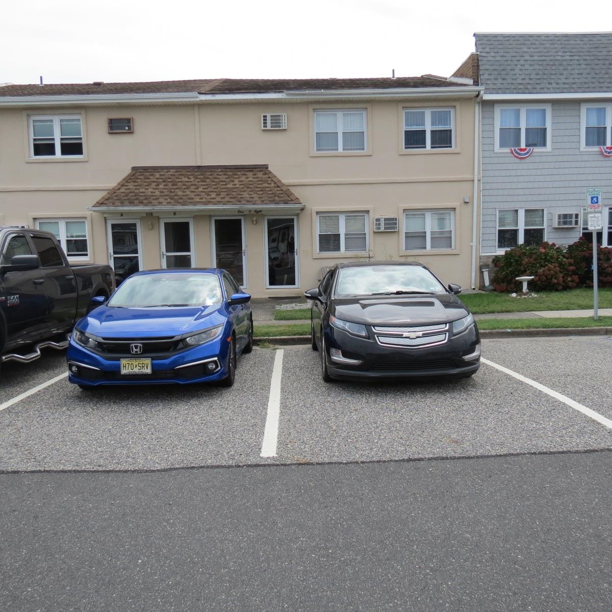 a car parked in front of a house