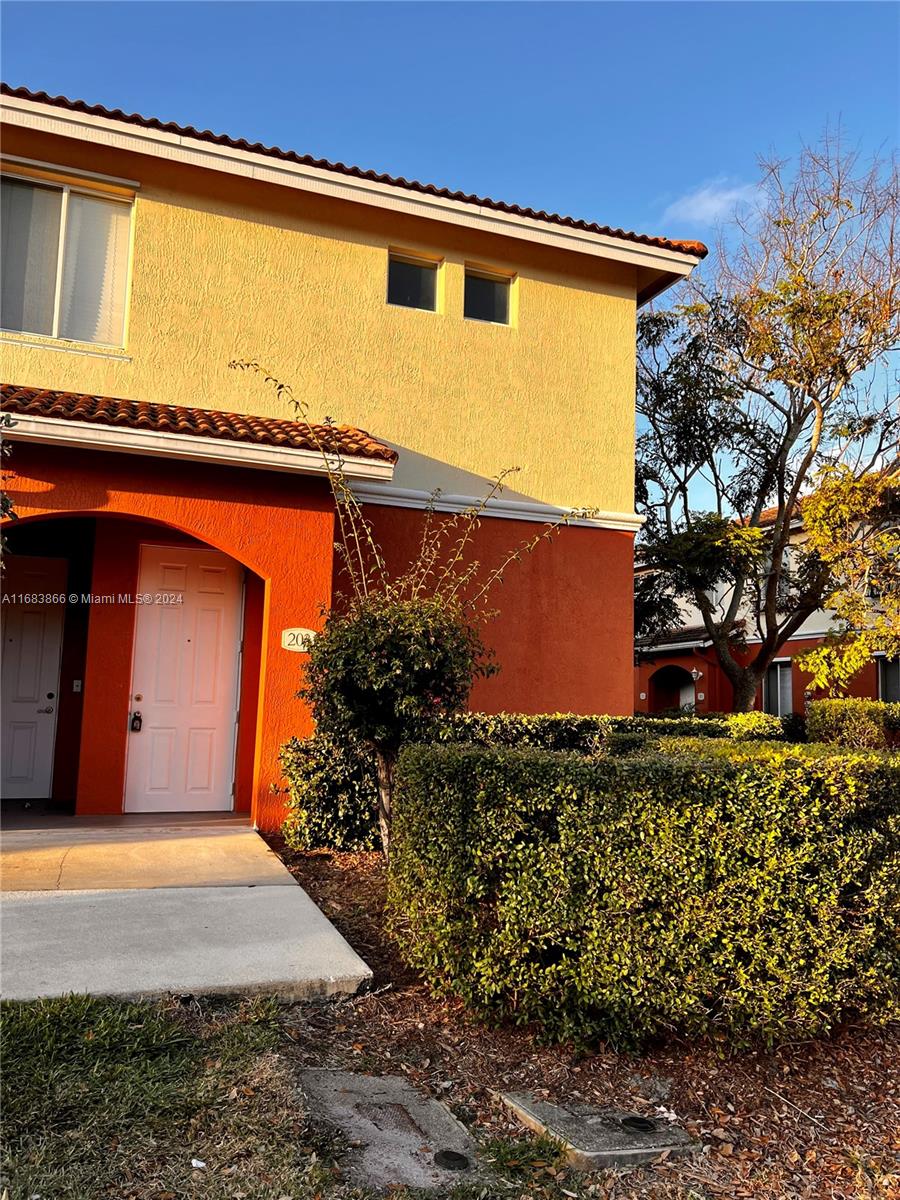 a front view of house with yard