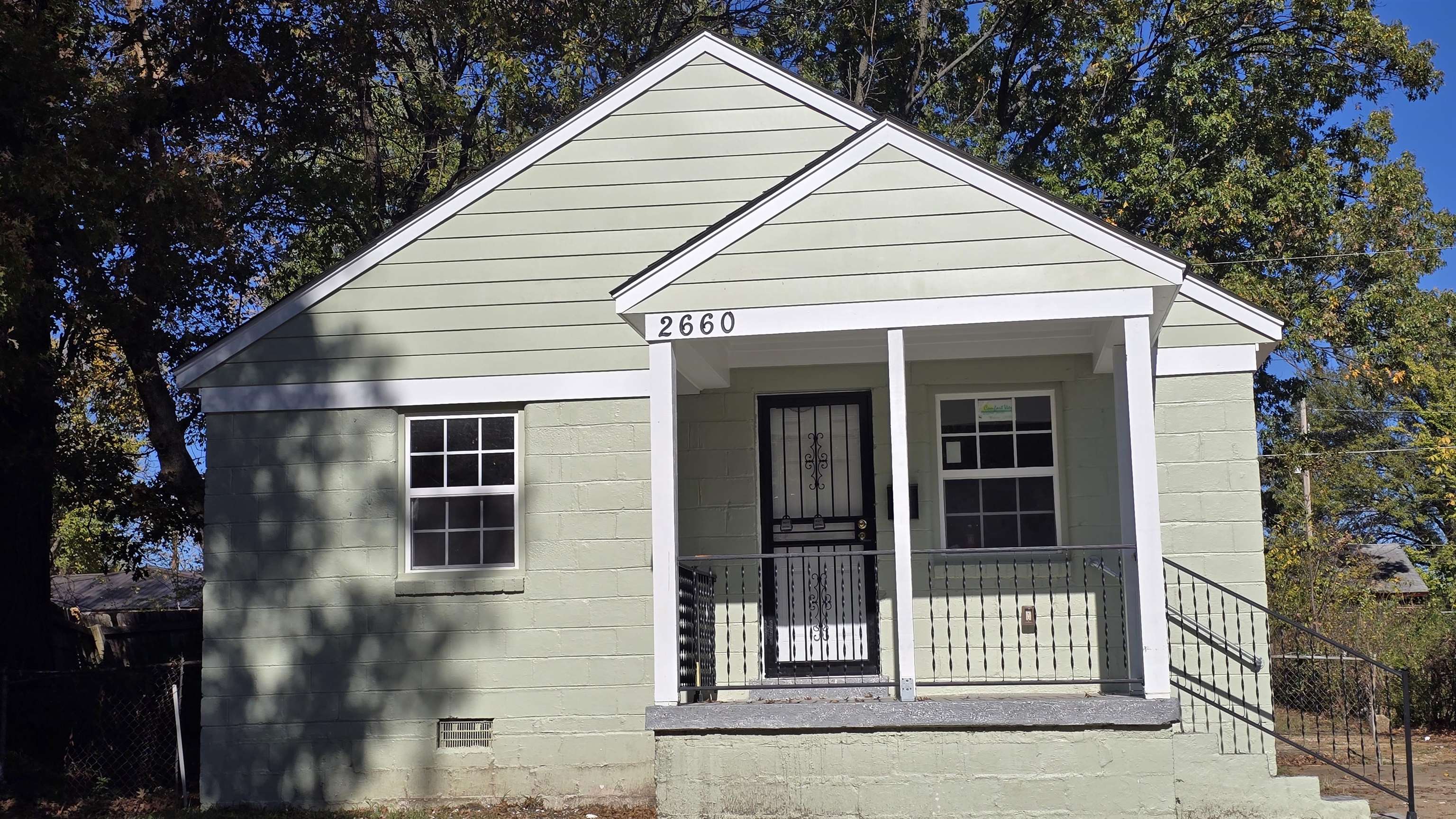 View of outbuilding with covered porch