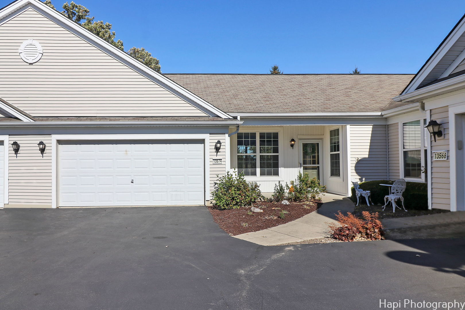 a front view of a house with a outdoor space