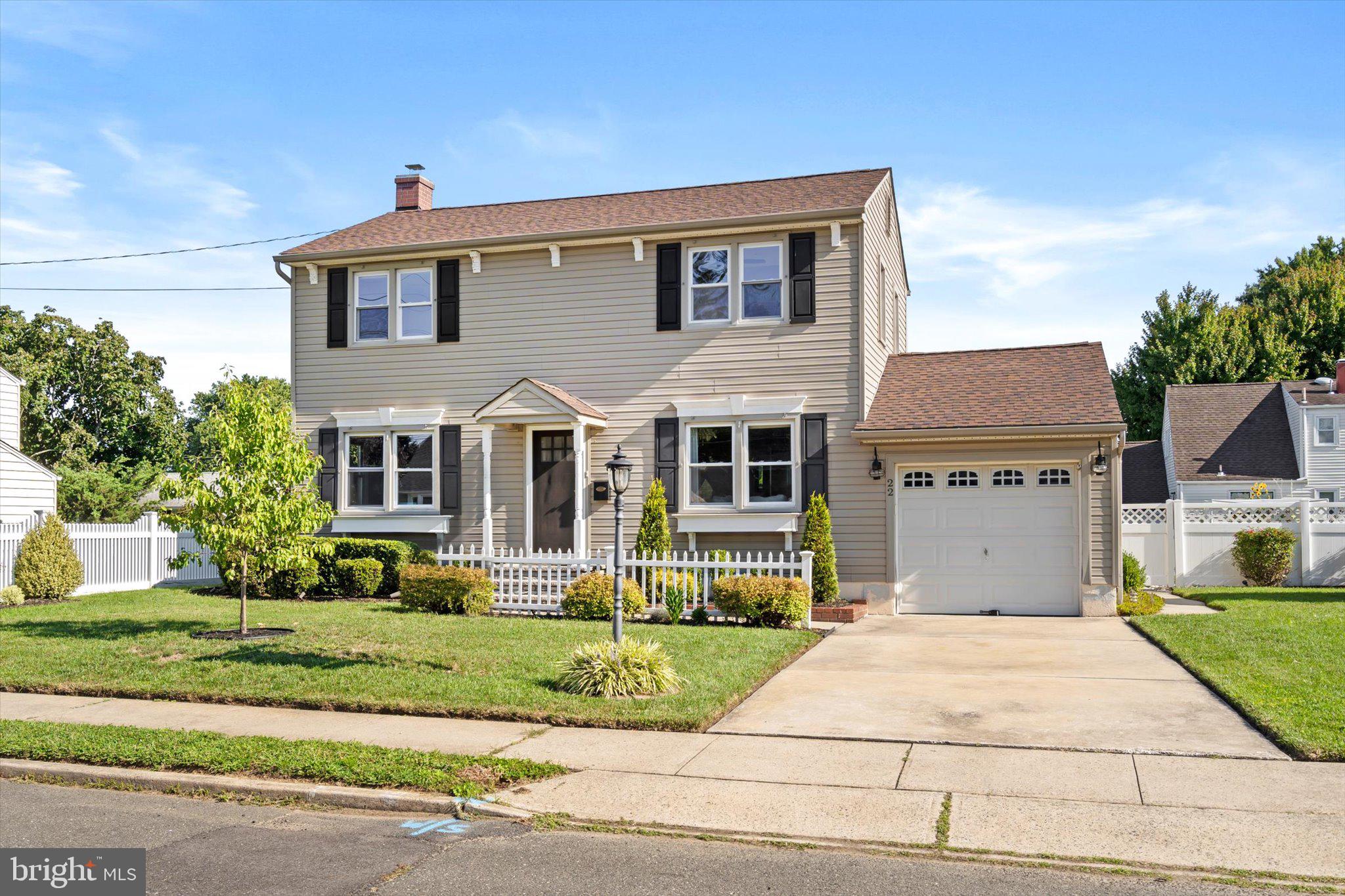 front view of house with a yard