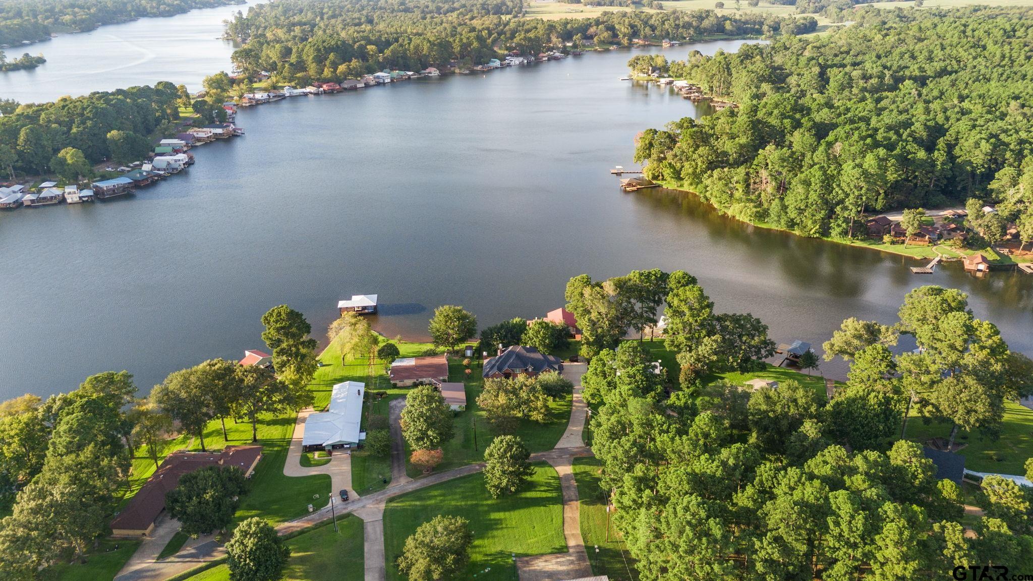 a view of a lake with a park