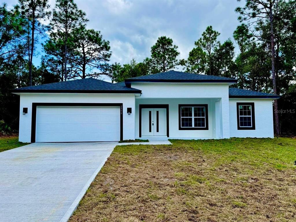 front view of a house with a yard