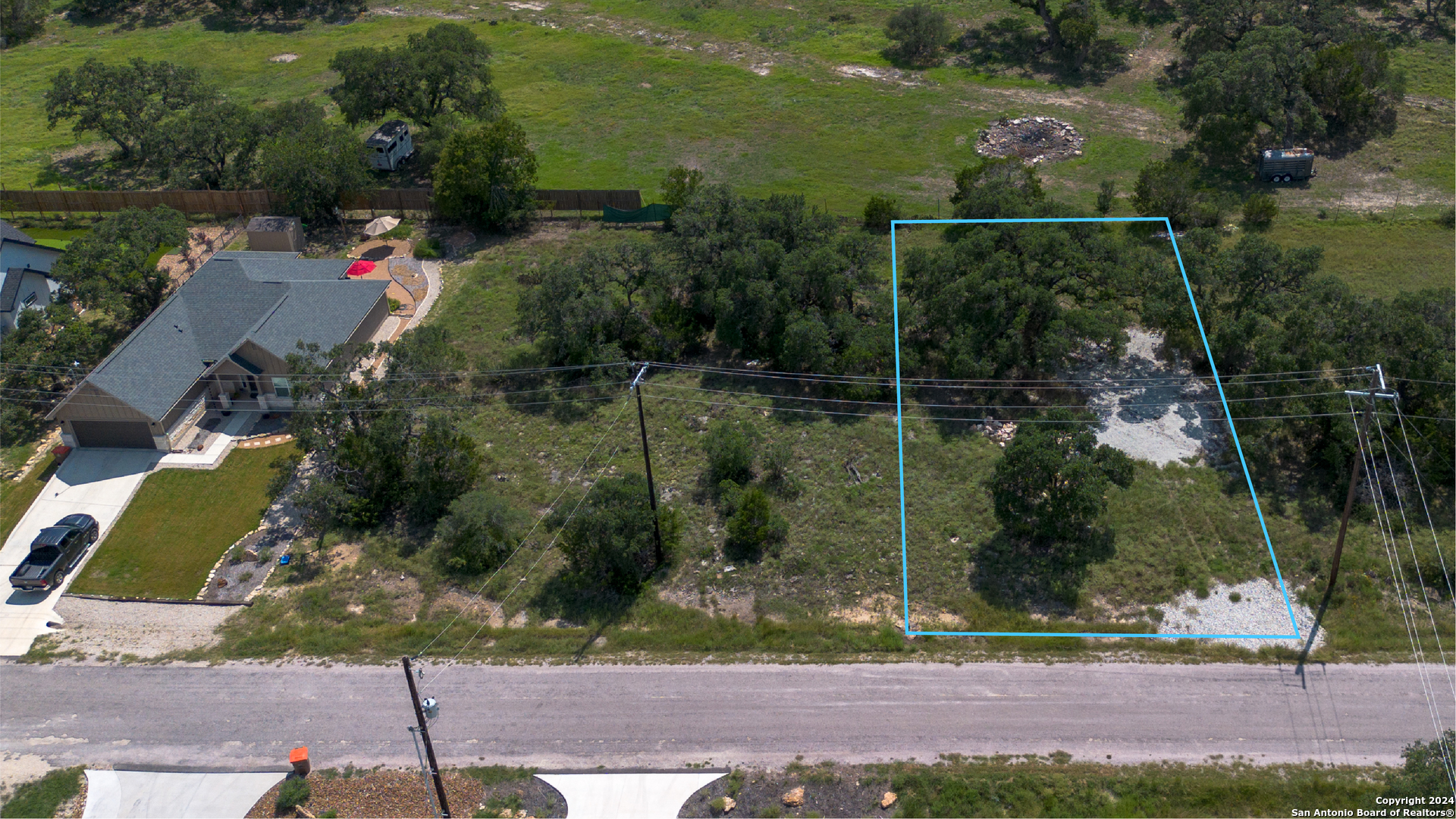 an aerial view of residential house with outdoor space