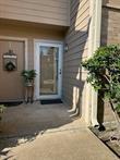 a view of a front door and a window