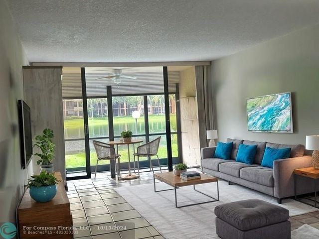 $230,000 | 5609 Coral Lake Drive, Unit 109 | Coral Gate