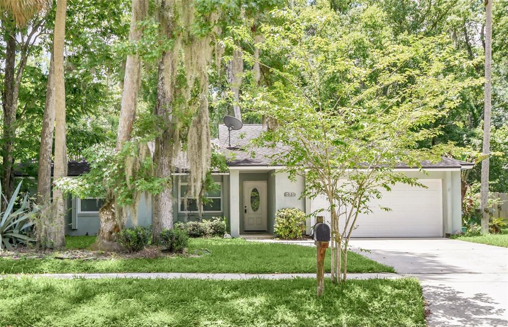 front view of a house with a yard