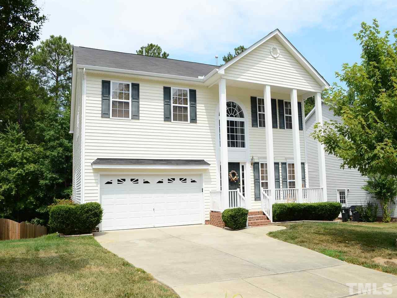 a view of a yard in front of a house