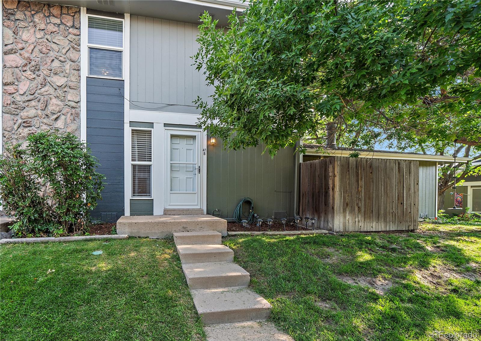 a view of a back yard of the house