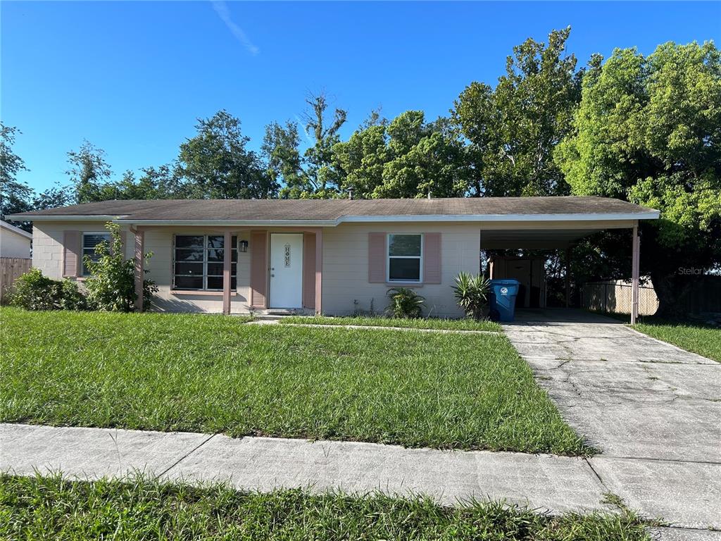 front view of a house with a yard