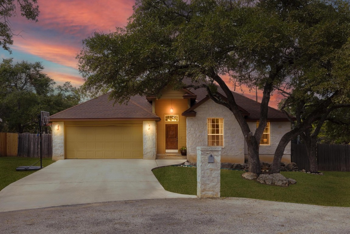 front view of a house with a yard