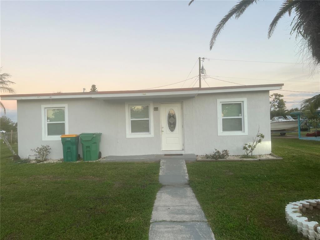 a front view of house with yard